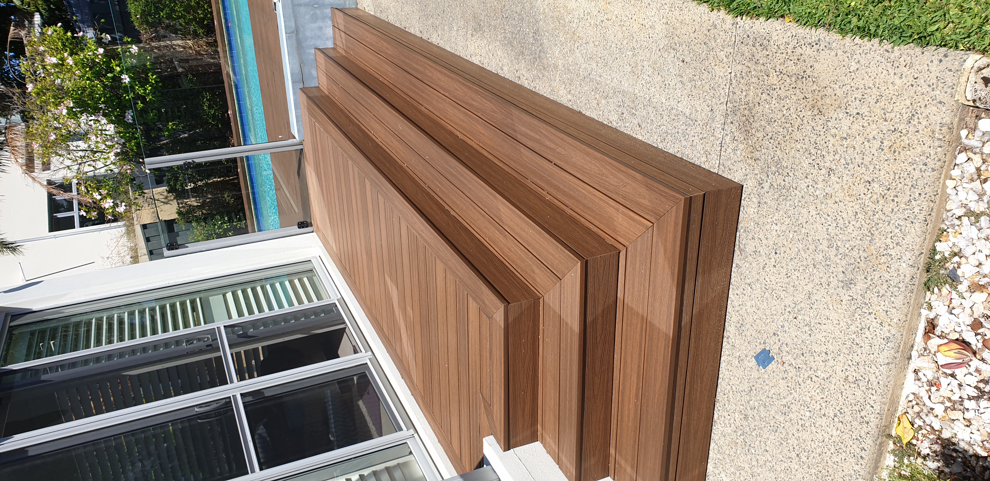 Hardwood pool deck chevron steps — SM Design & Build